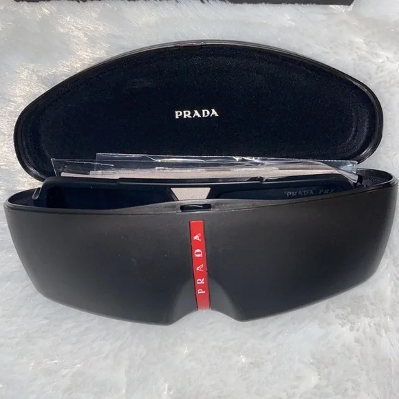 Prada SunglassesauthenticUnisexblackNever worn!!!